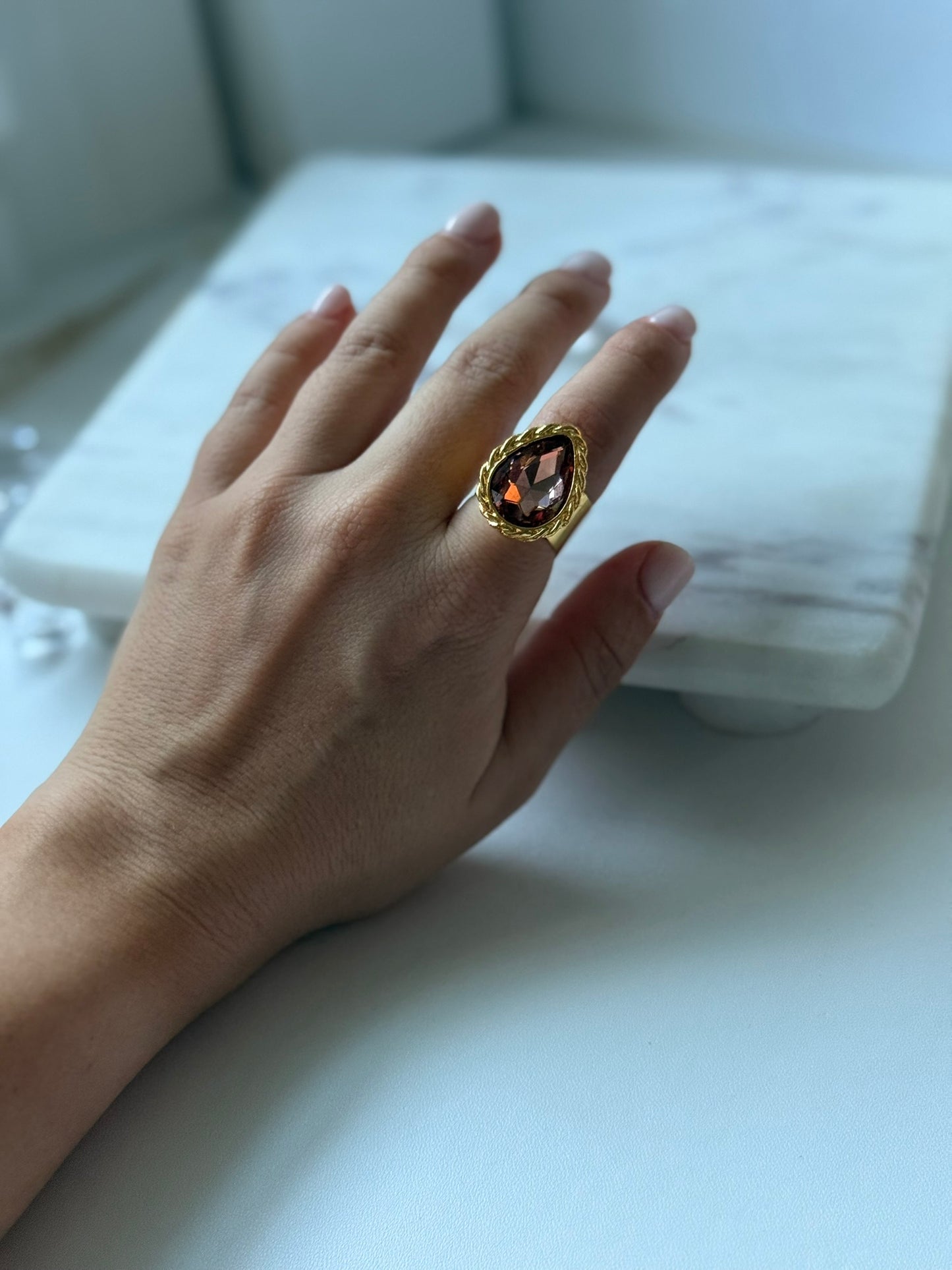 AURA CORAL RING BRONCE