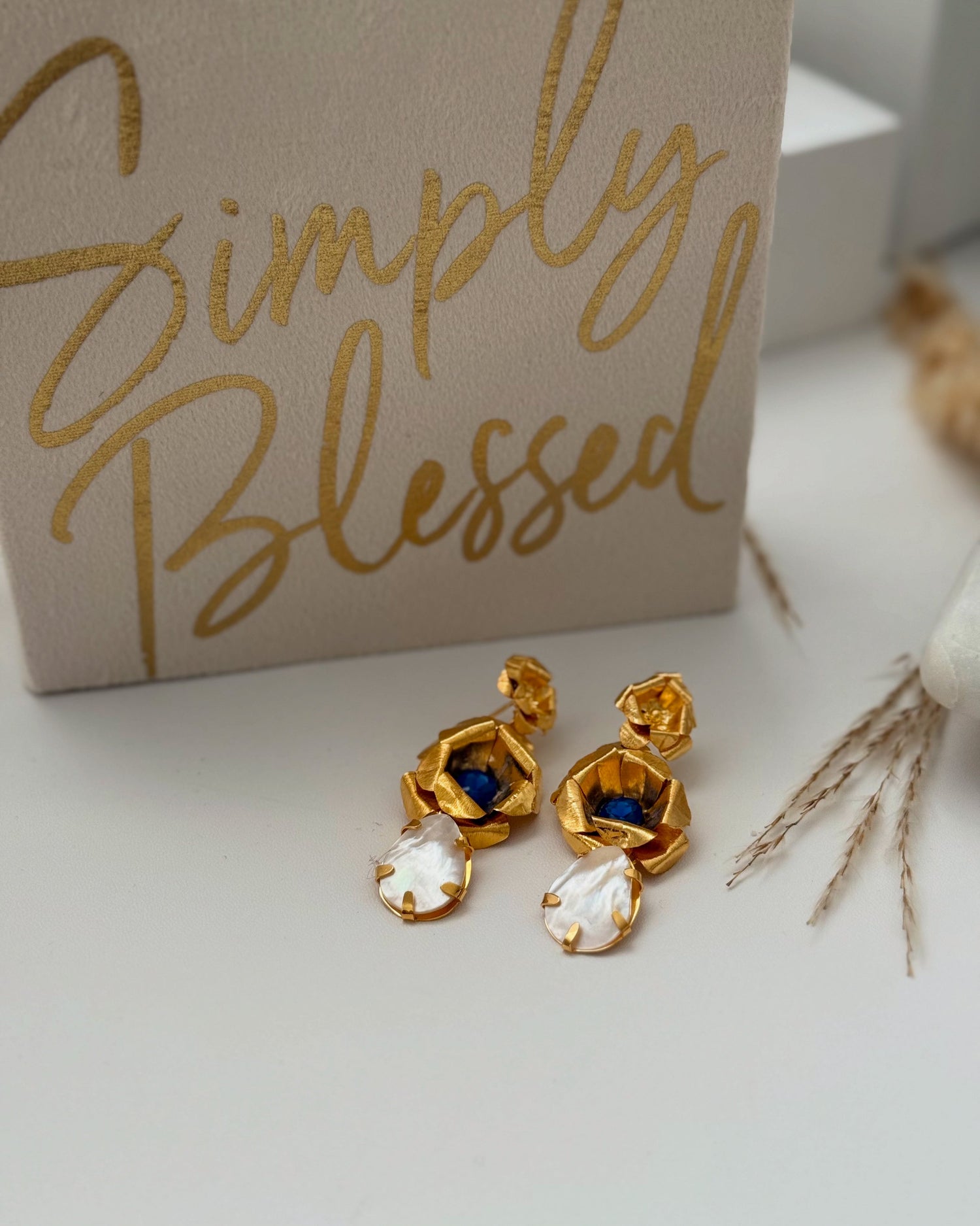 Discover handcrafted earrings →
