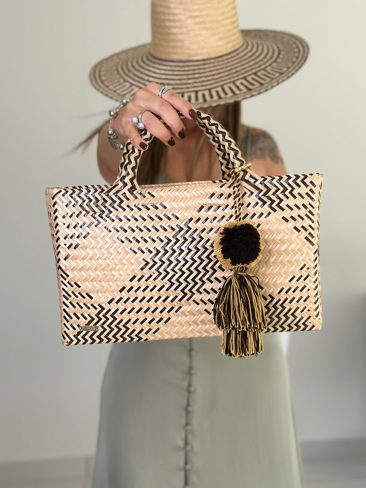 Explore timeless HANDBAGS →